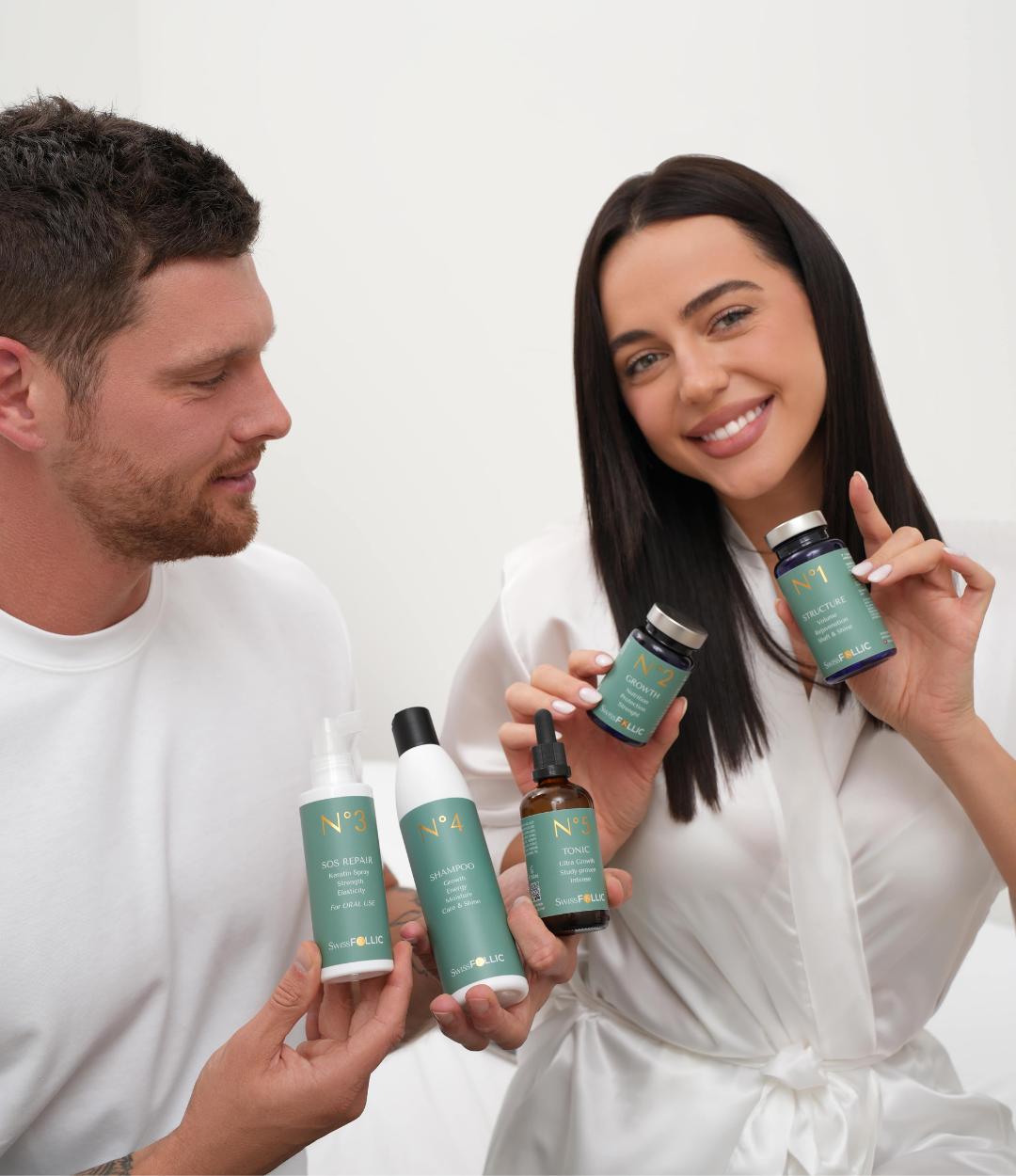 A man and a smiling woman showing the 5 SwissFOLLIC products for hair growth